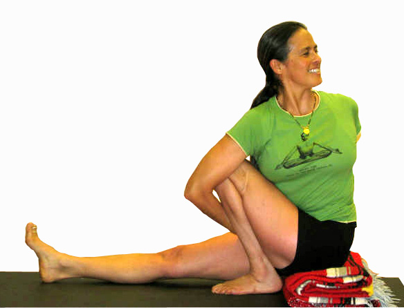 Yoga teacher Rebecca Lerner doing a twist